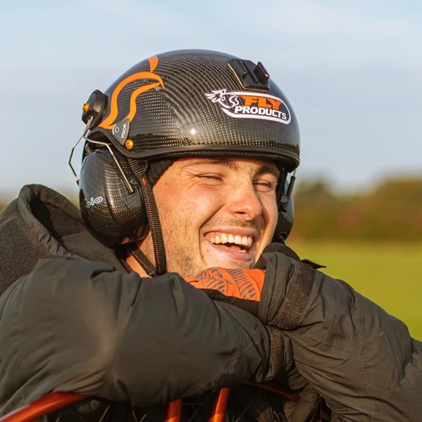Jack Pimblett smiling in his flying helmet