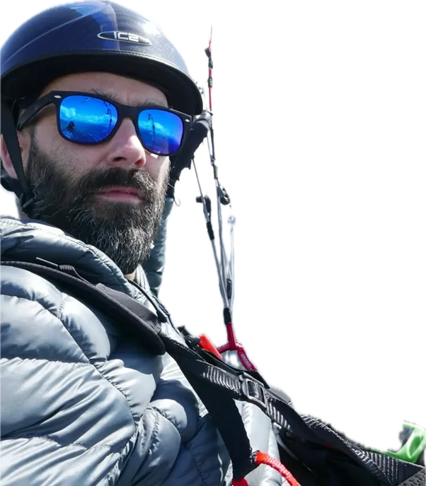 Martin Ayers wearing his flying helmet and mirrored sunglasses
